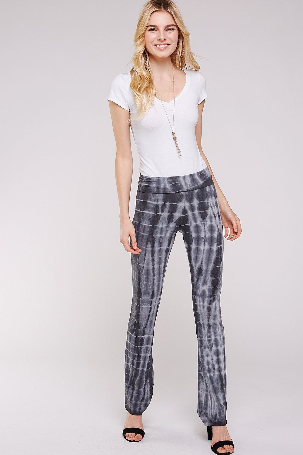 Beautiful woman wearing an Black and Gray Bamboo,straight-leg yoga pant fit is comfortable and flattering