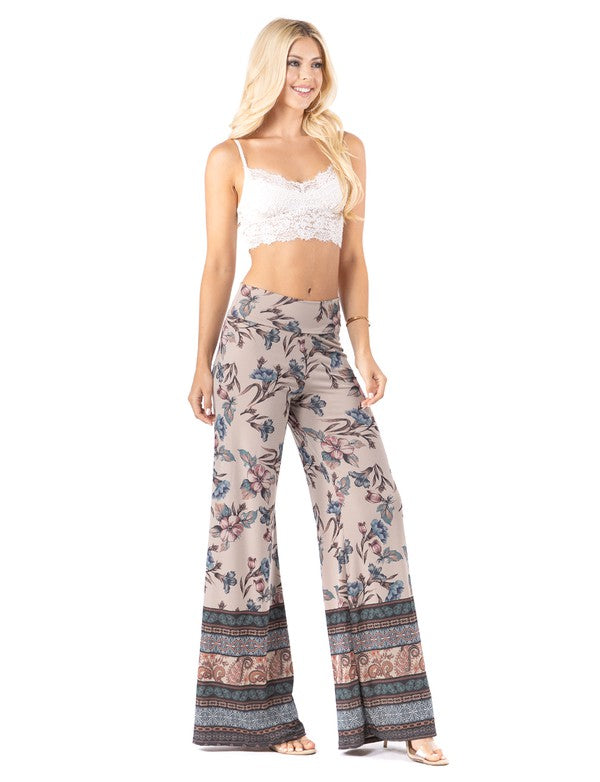 Beautiful woman wearing this amazing Blue Floral  High waist palazzo pants featuring pockets, wide legs, and a comfortable stretchy fabric Perfect for any activity,relaxing day,beautiful and unique,comfortable and flattering,