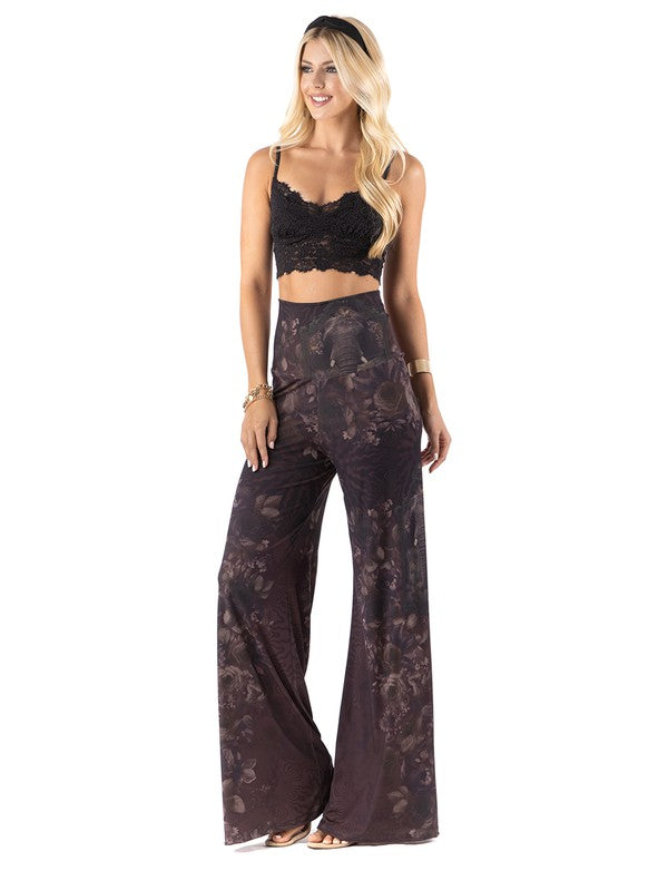 Beautiful woman wearing this amazing Dark Floral   High waist palazzo pants featuring pockets, wide legs, and a comfortable stretchy fabric 